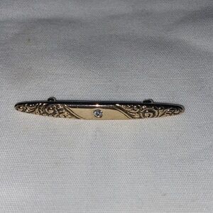 Elegant Gold Tone Bar Brooch with Rhinestone Accent